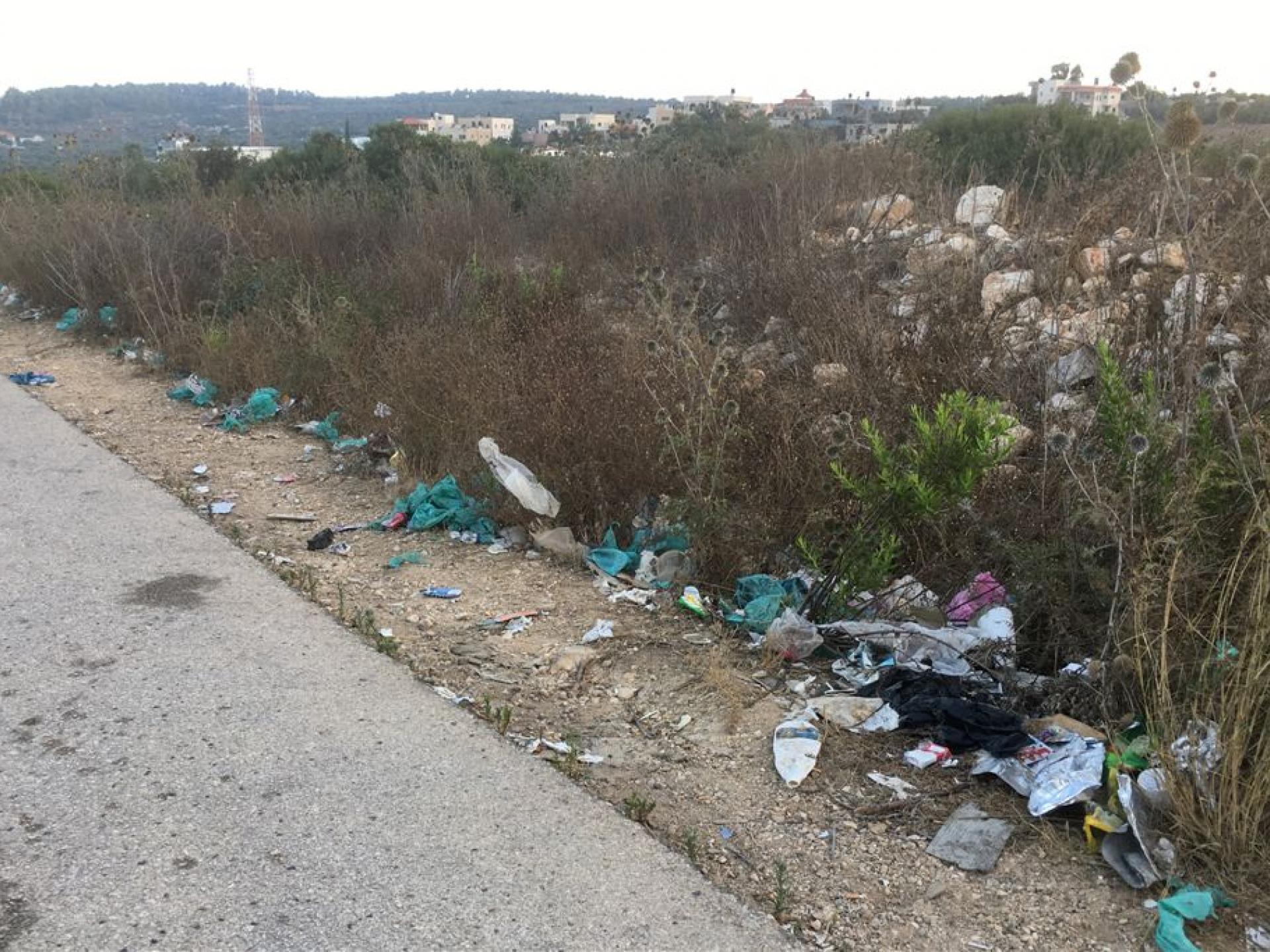 Tura  Shaked Checkpoint: IDf’s garbage along the road to the checkpoint