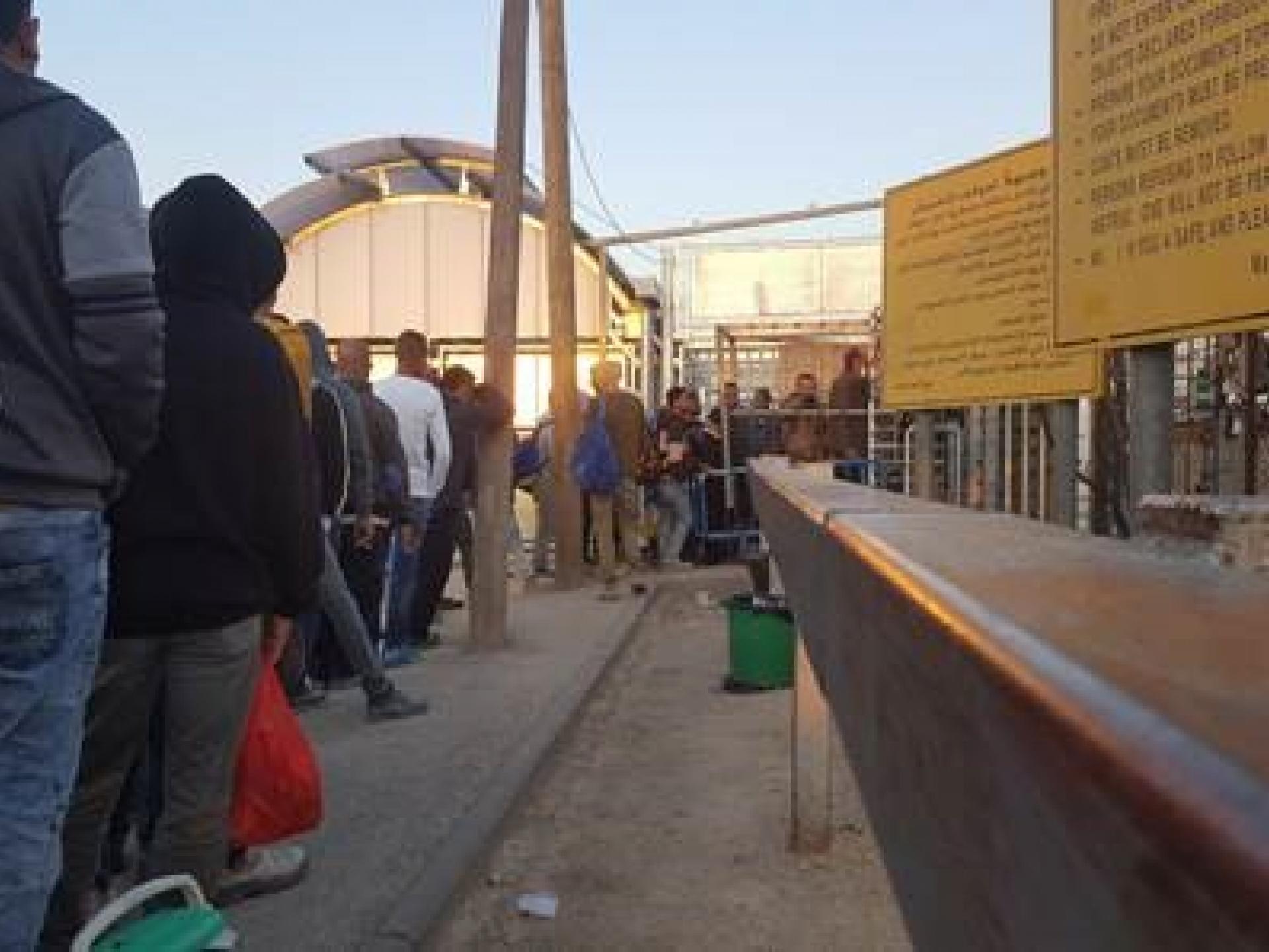 Barta’a Checkpoint – morning waiting line, standing and waiting together
