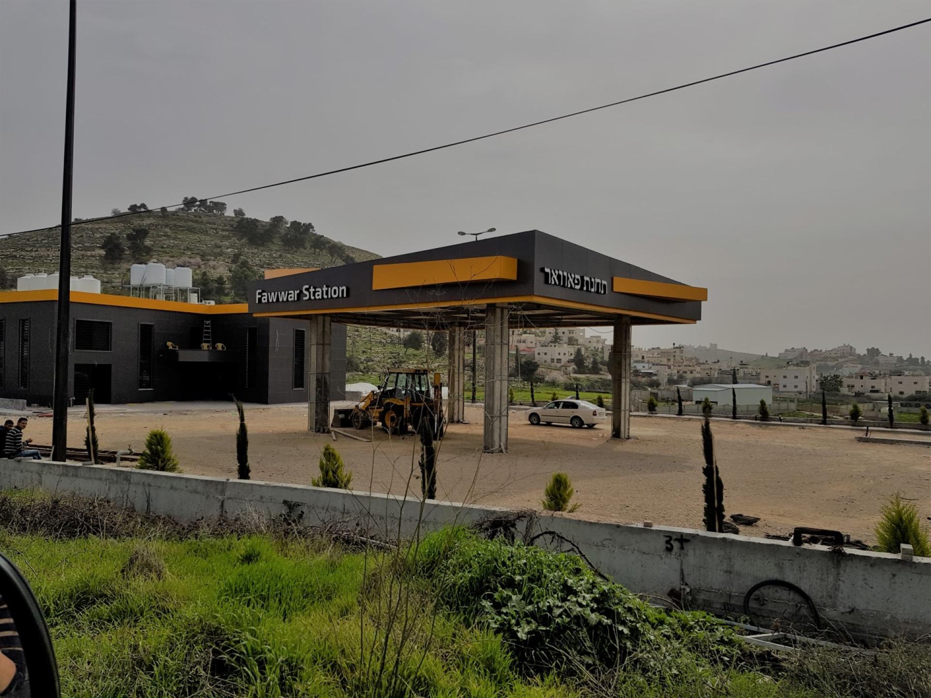 A new gas station being built at the junction of Dura-al Fawwar