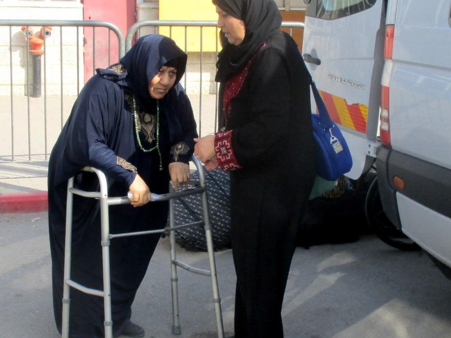 A patient returning from al-Najah hospital to her home in Gaza