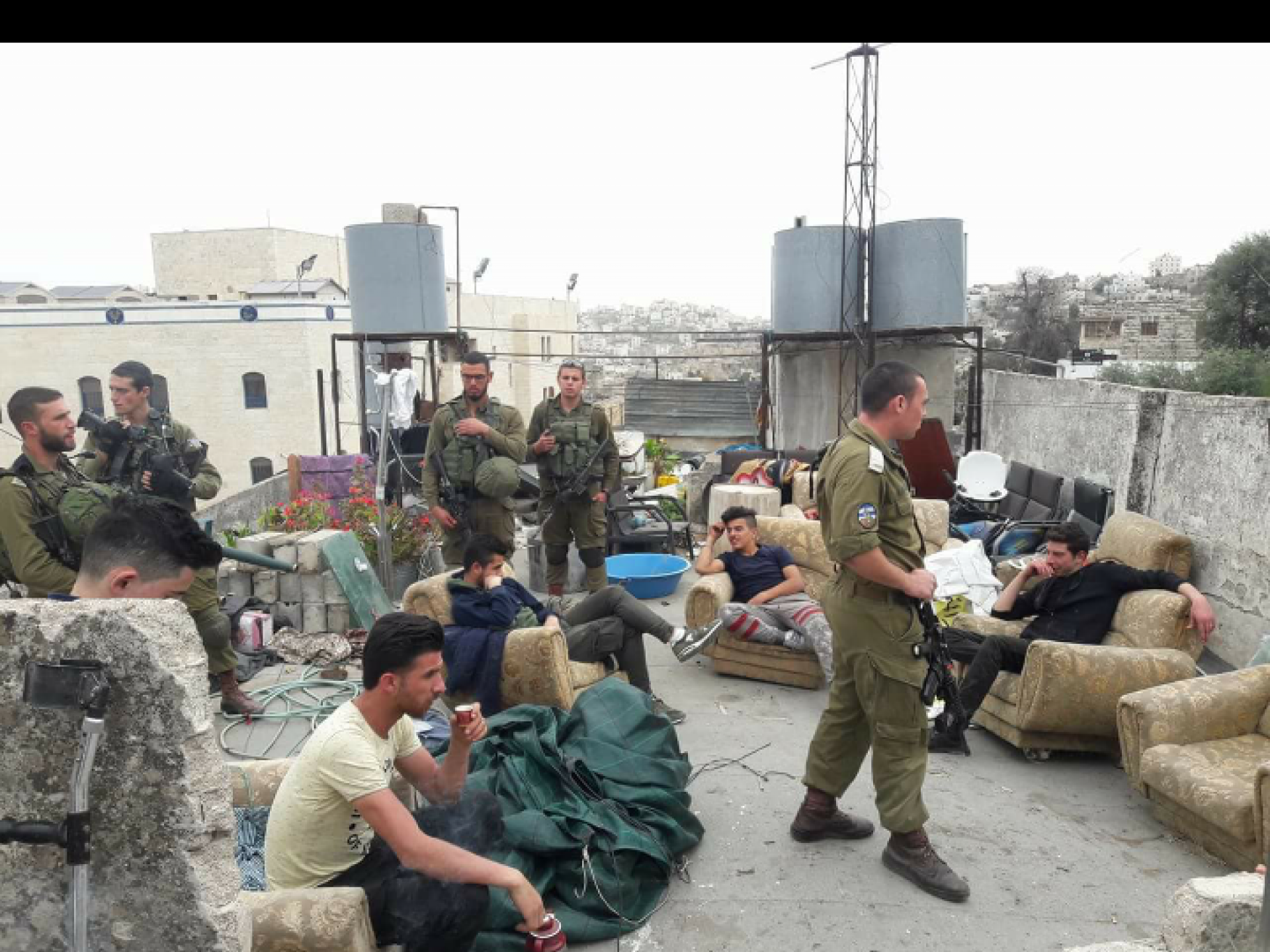 On Saturday, settlers and the  army came up to the roof 