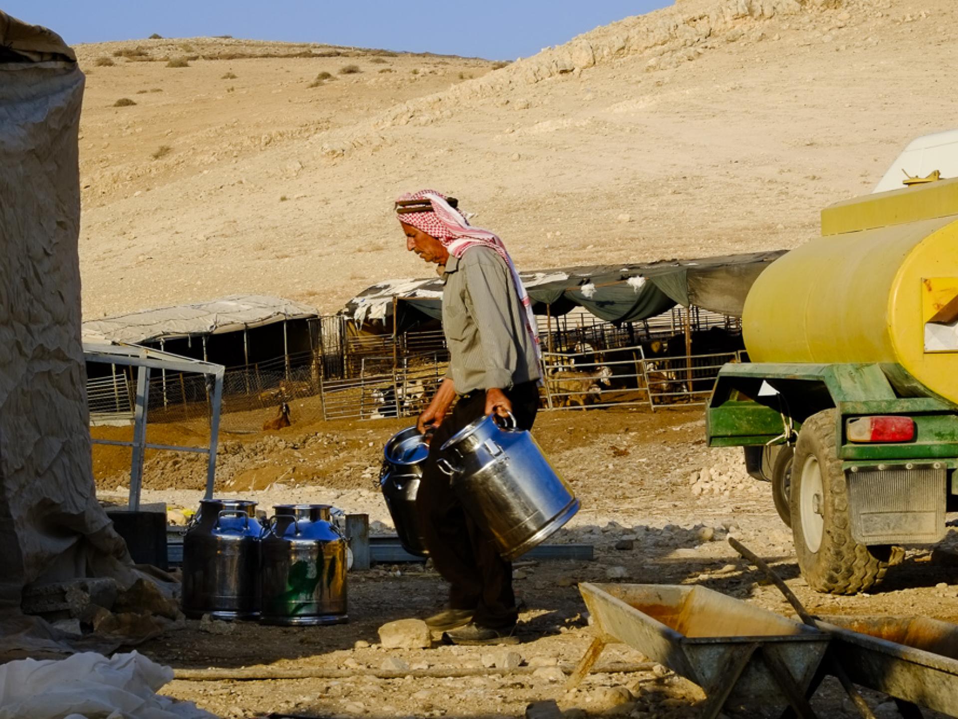 milk cans at the El Hama shepherds' community –