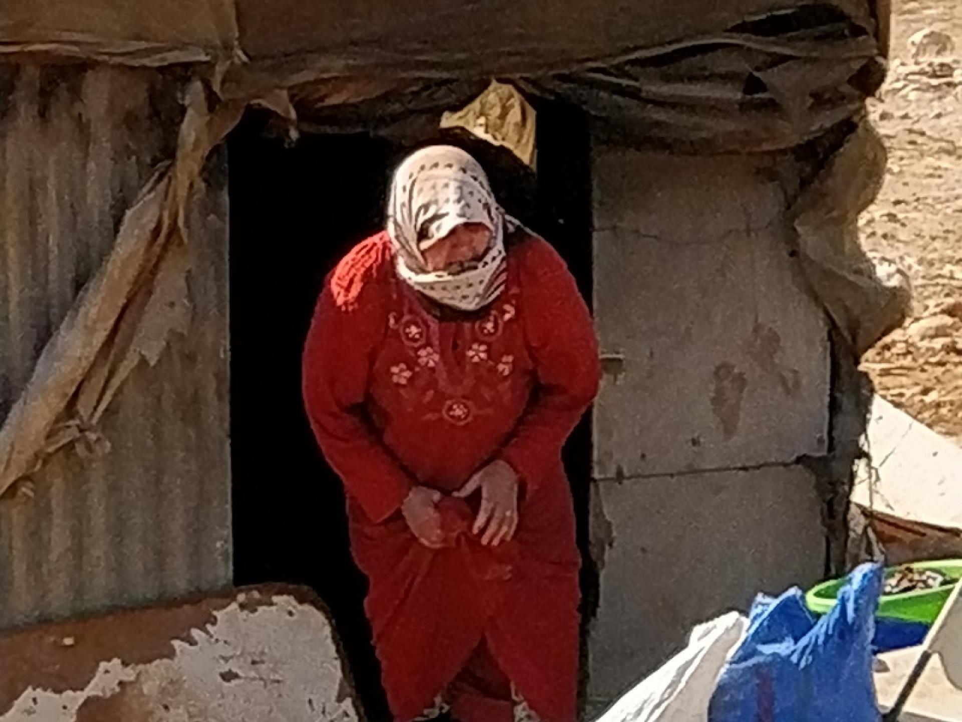 Yarza, Jordan Valley:  Just before she’s forced to leave a woman extinguishes her clay oven