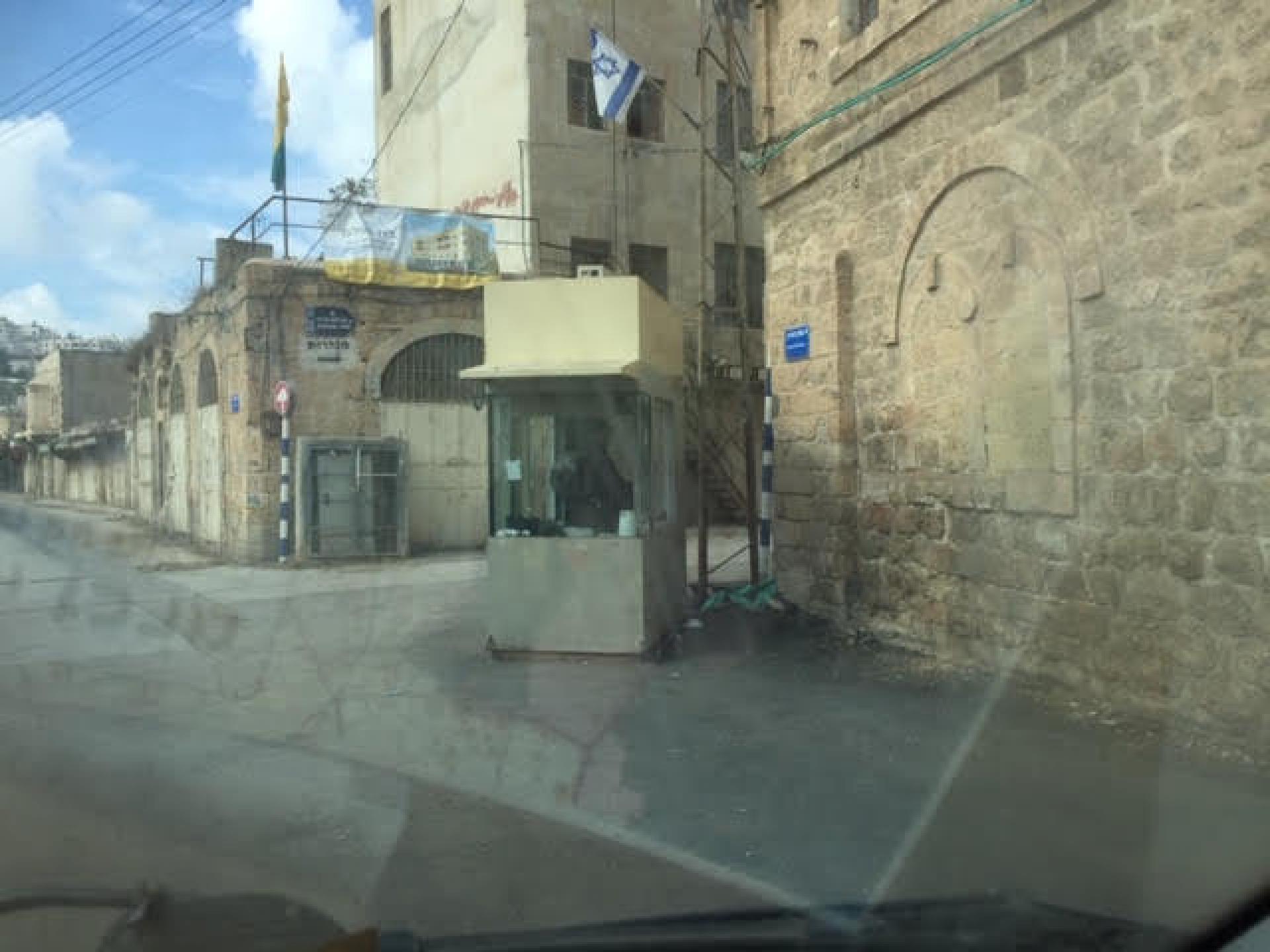 The checkpoint at the entrance to Abraham Our Father neighborhood