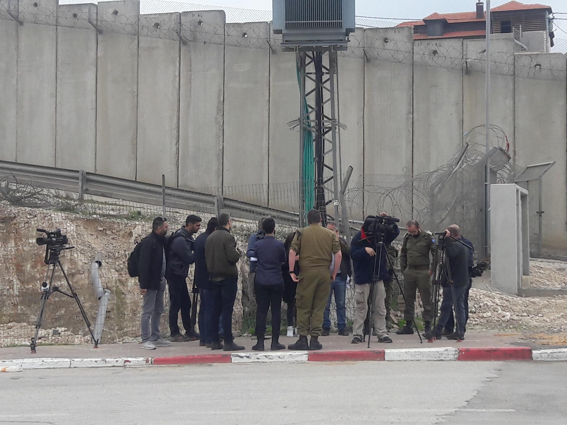 Soldiers briefing journalists on the new checkpoint in Qalandiya 