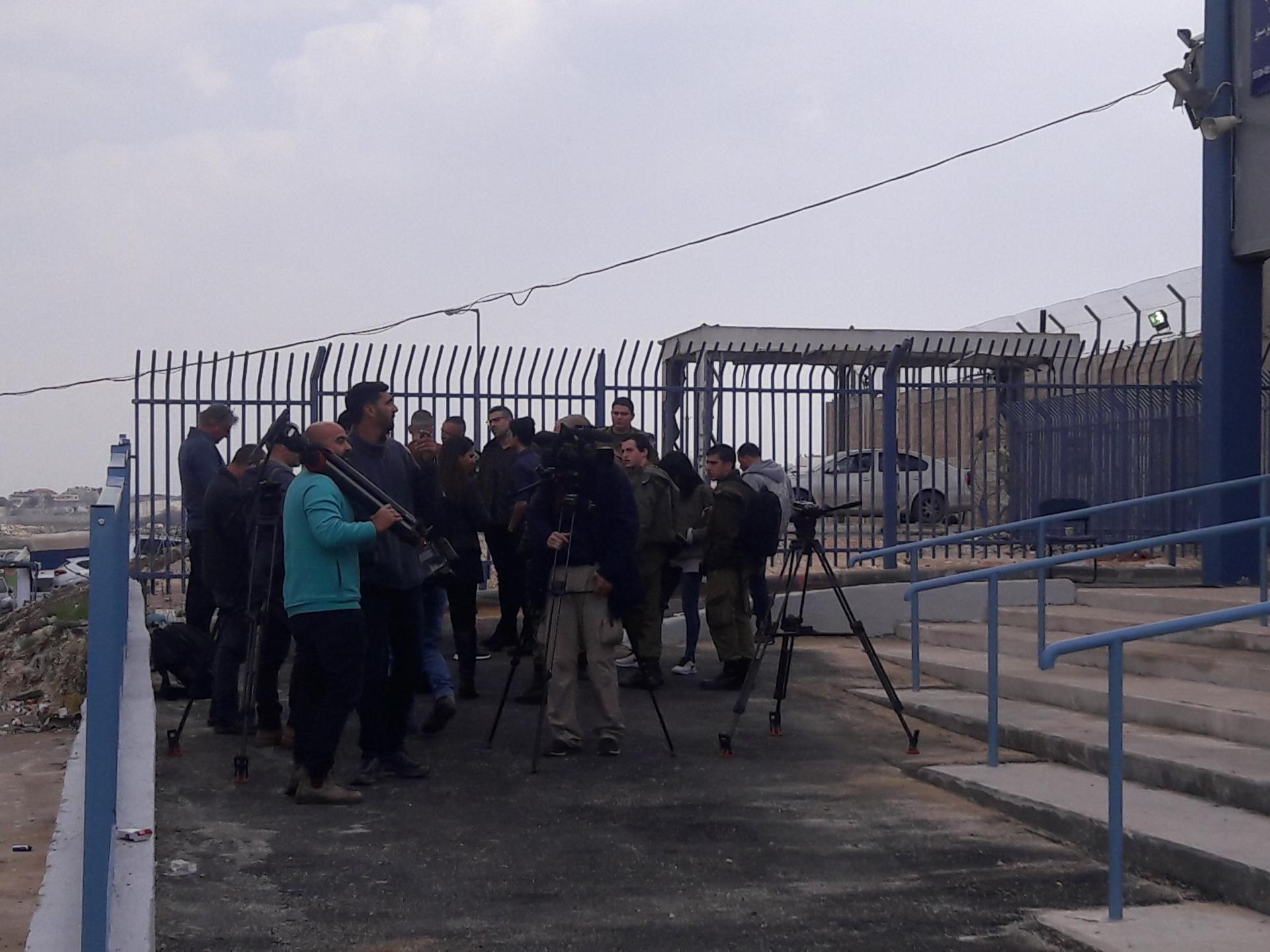 Journalists on the Palestinian side of the new checkpoint