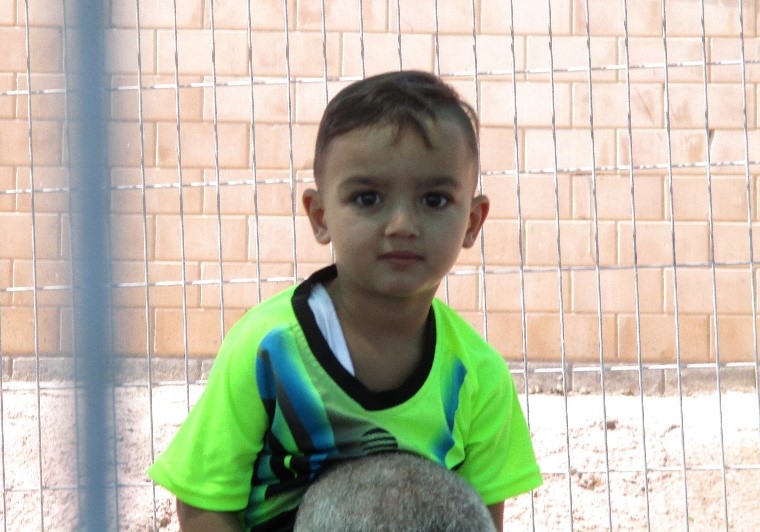 child on shoulders 1.jpg