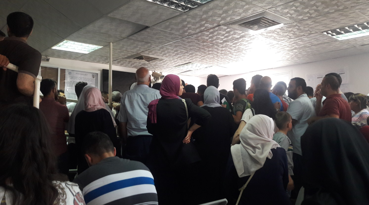 a lot of people crowded hoping to get some service