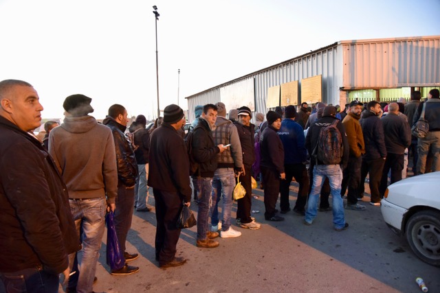 Queues in the parking lot in Qalandiya - 15.3.2017.jpeg