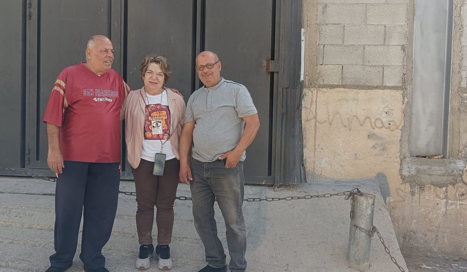 Shuafat: Kamal with a childhood friend from UNRWA school