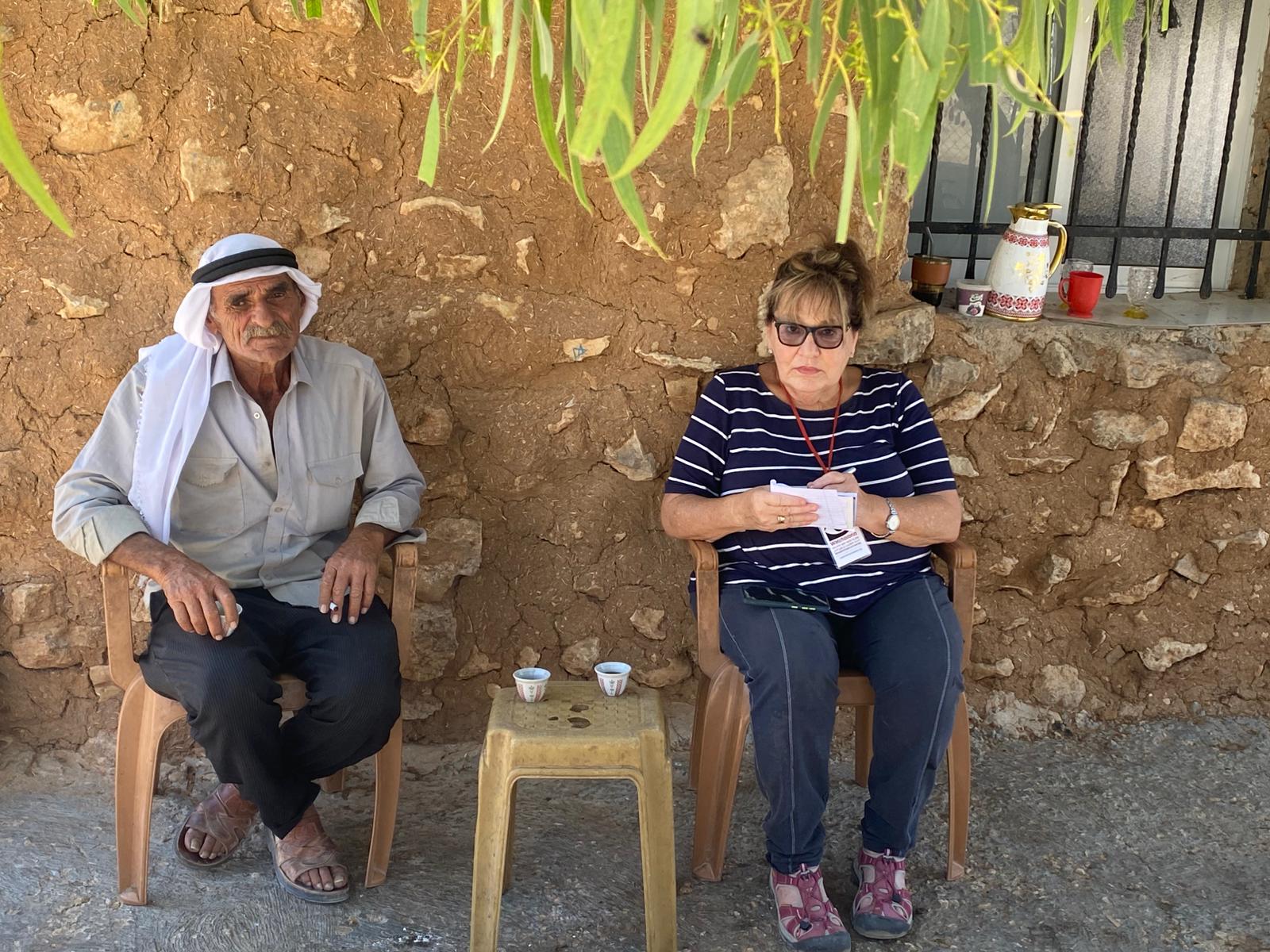 Michal talks with Is'hak Jabarin