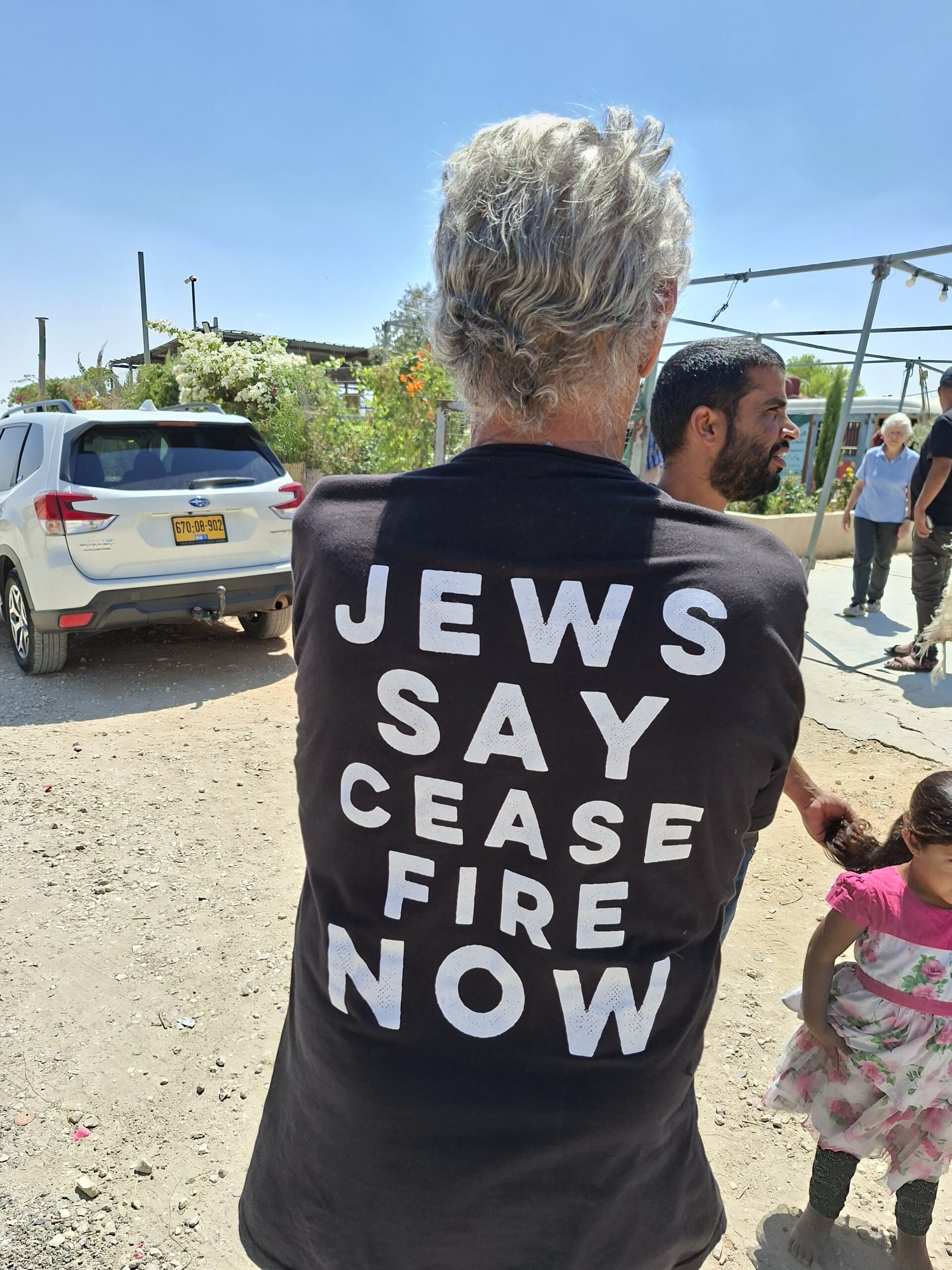 Umm al-Khair - the back of the US volunteer’s shirt 