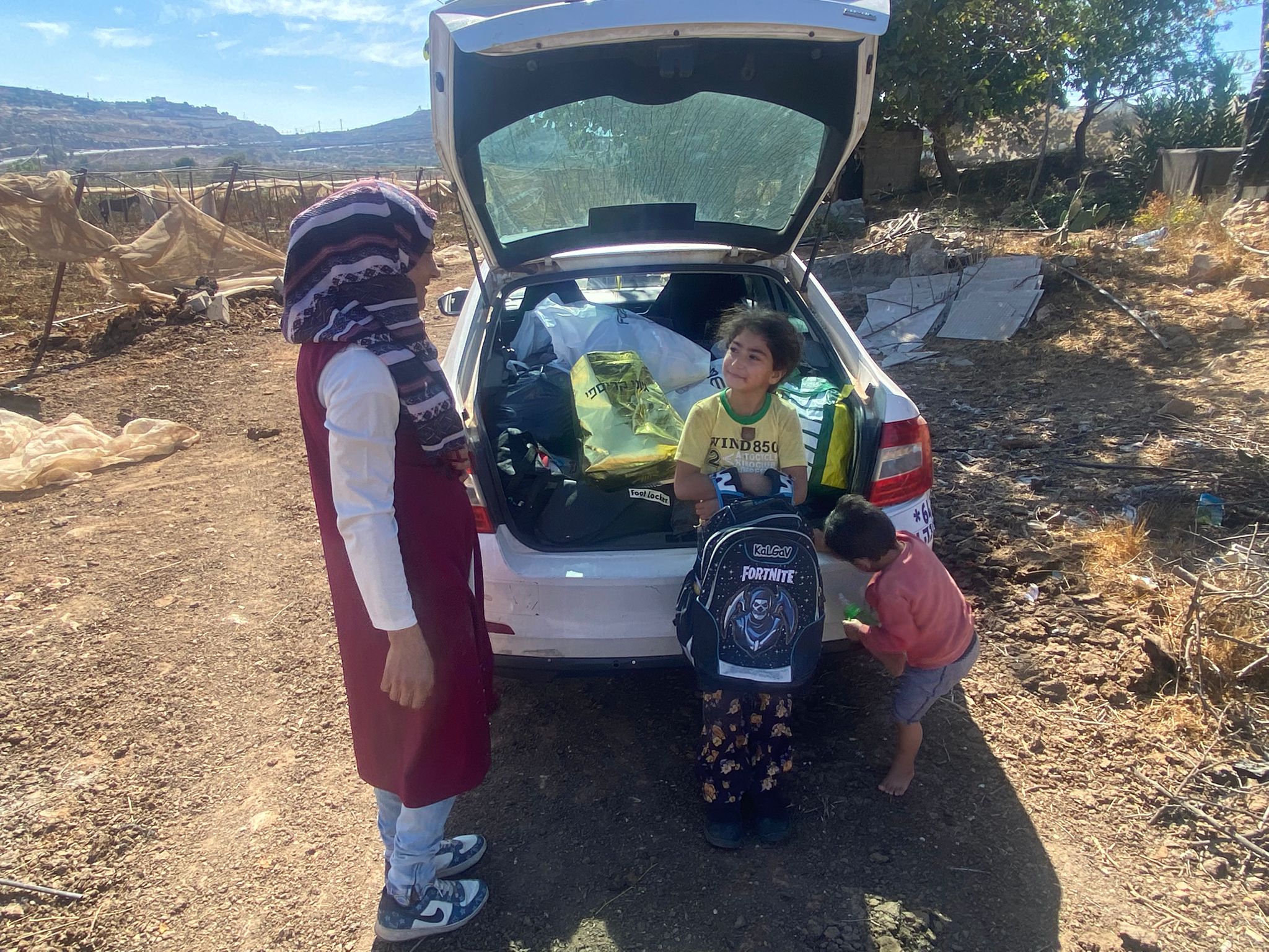 The Jaber family received food and clothing collected and donated by Michal and Smadar