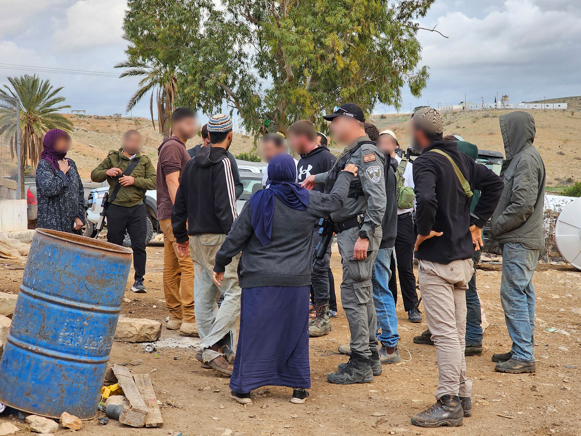 Hammam al-Malih: Border Guard and settlers in the compound