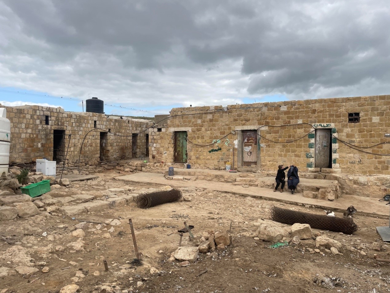 Hammam al-Malih: The woman sits outside with us, awake but tired