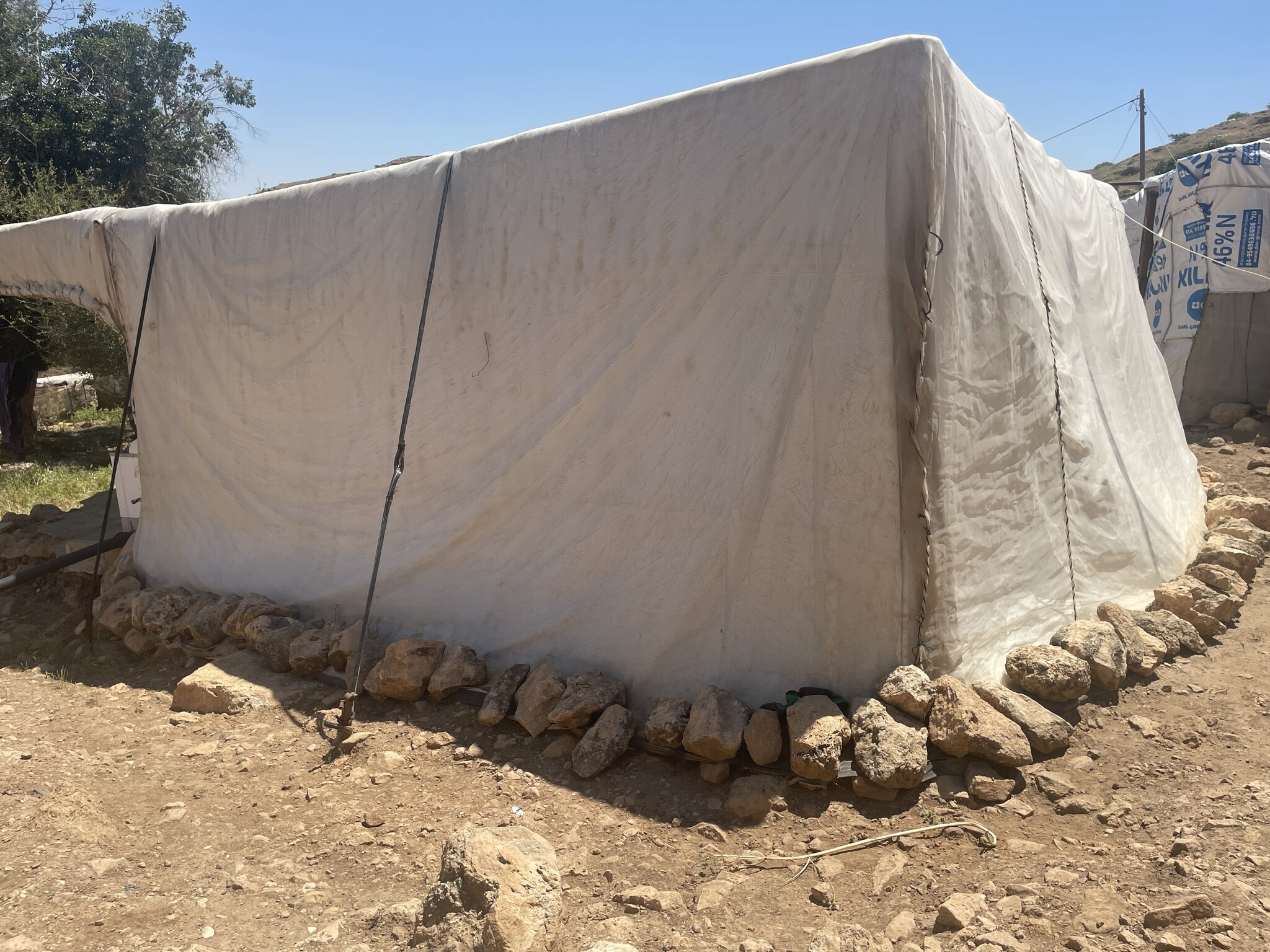  Hamra: Living quarters. Inside, it's as clean as a pharmacy; outside, swept clean with a broom