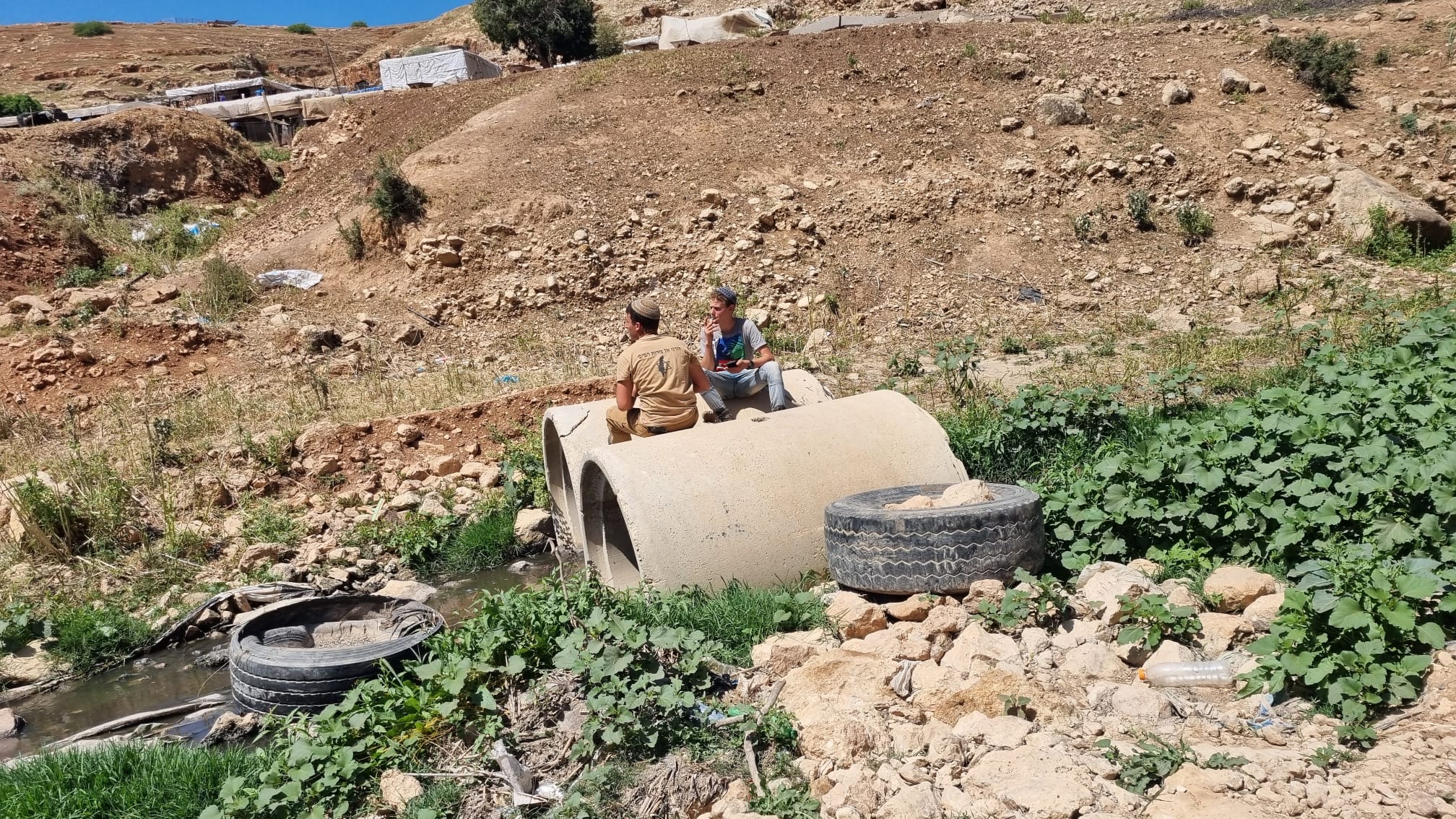  Hamra: Two 'Sharvit' youths on the sewage