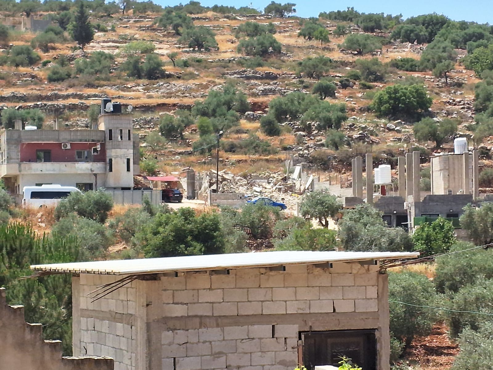 Yatma. Houses in Area C - One Demolished and One Under a Work Stop Order