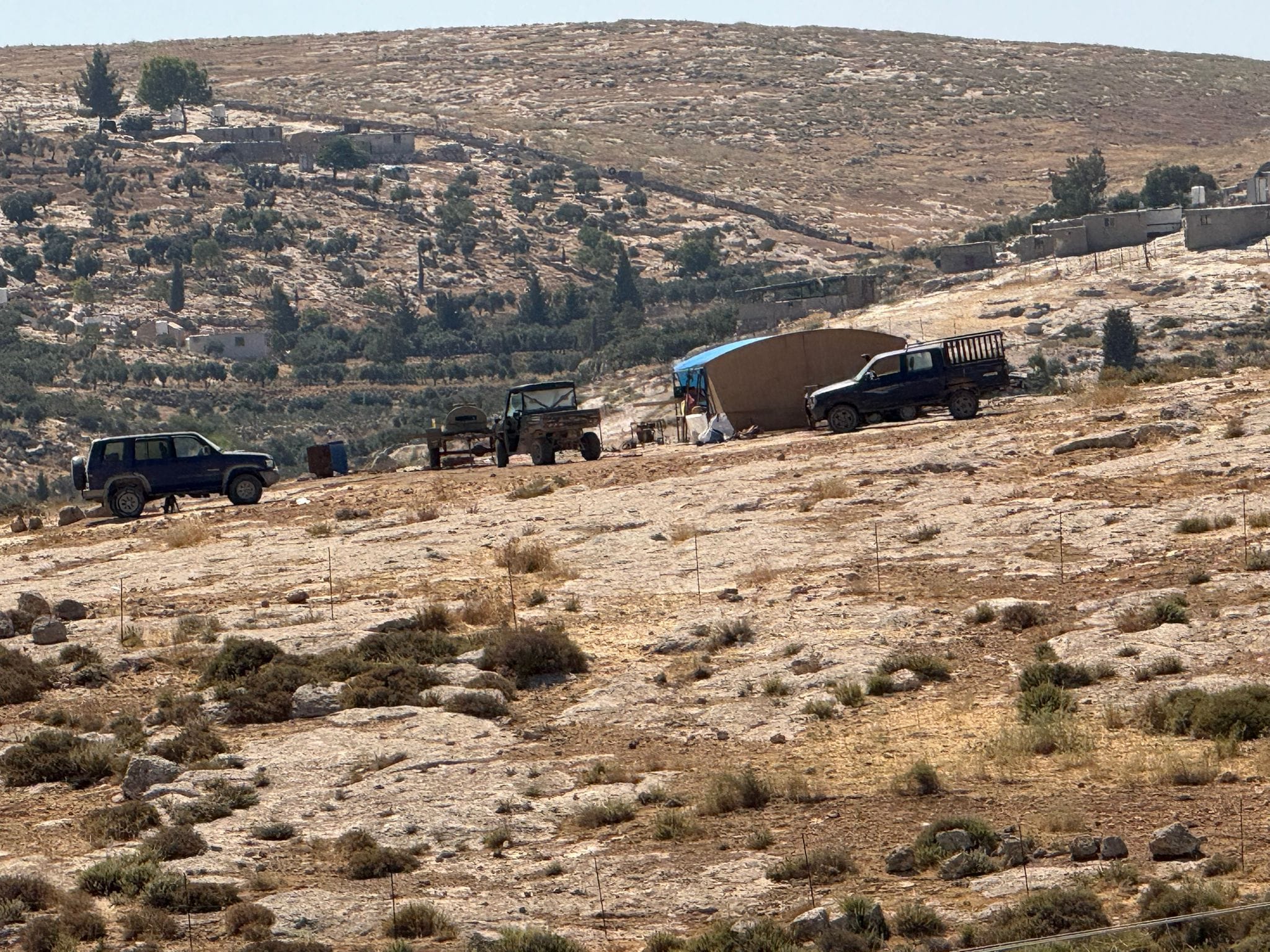 Sha'ab al-Butum - the new settlement that sprang up near them about a month ago is visible