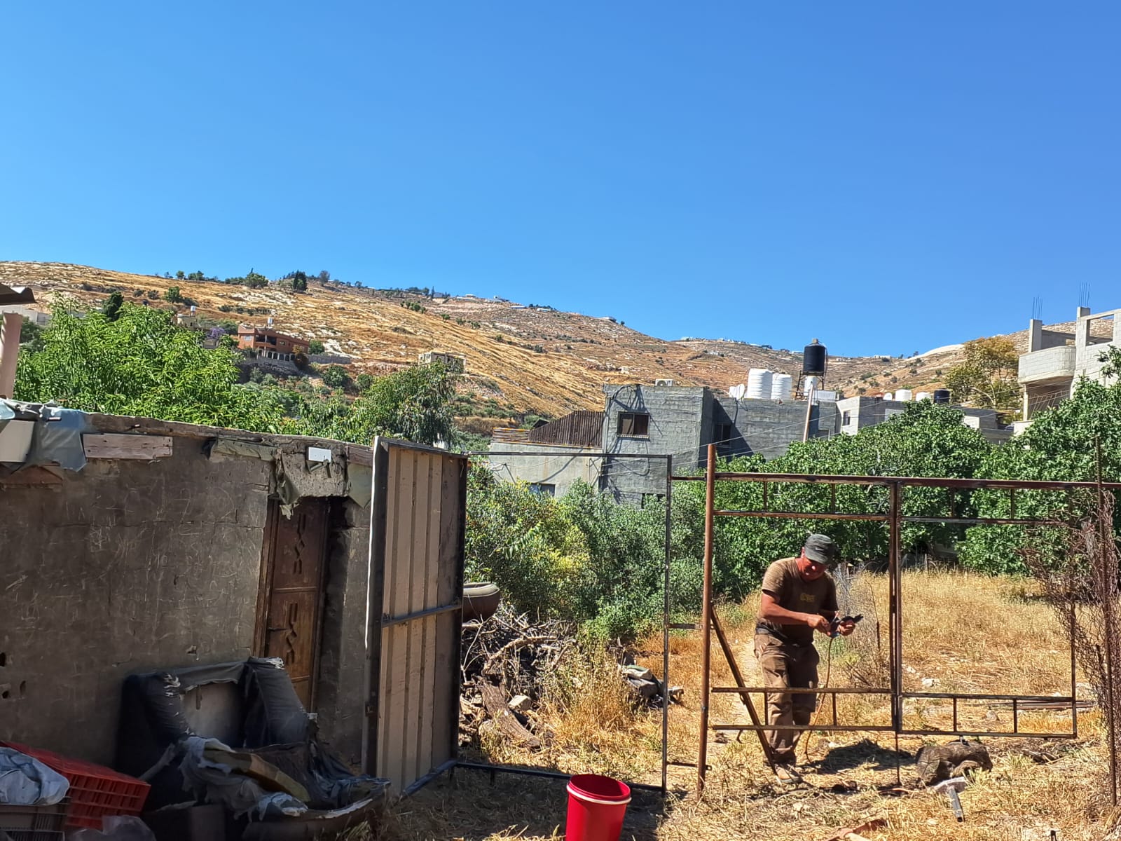 Einabus. Repairing the Broken Gate and Fence