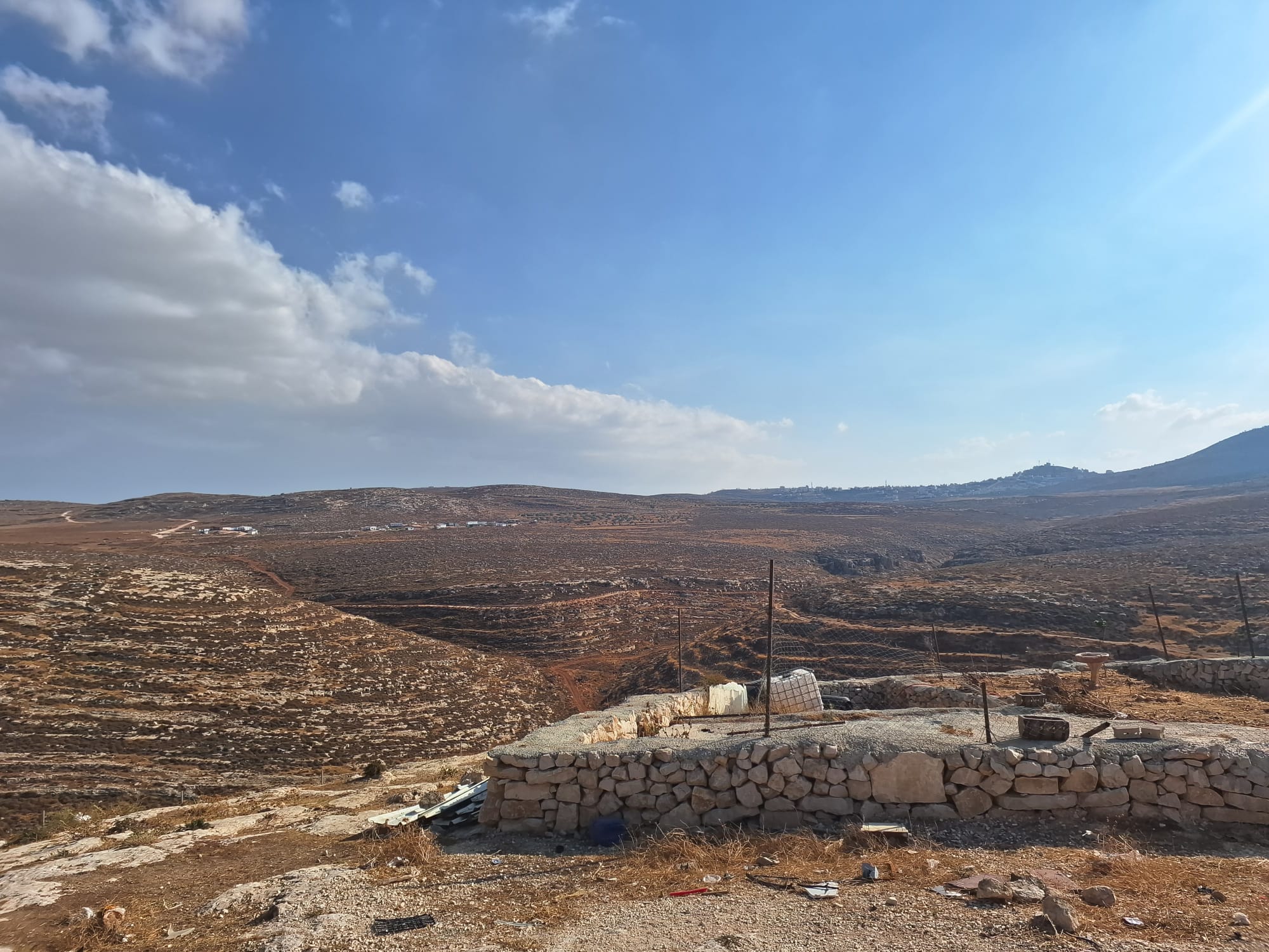 Khirbet al-Marajem. View toward al-Mughayyir and the new settlement
