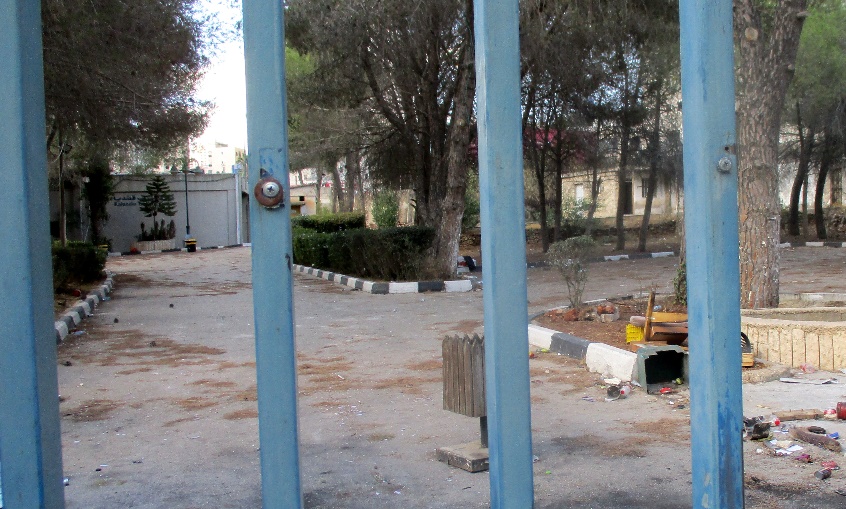 Kfar Aqab (Jerusalem). The gate to the UNRWA compound is locked