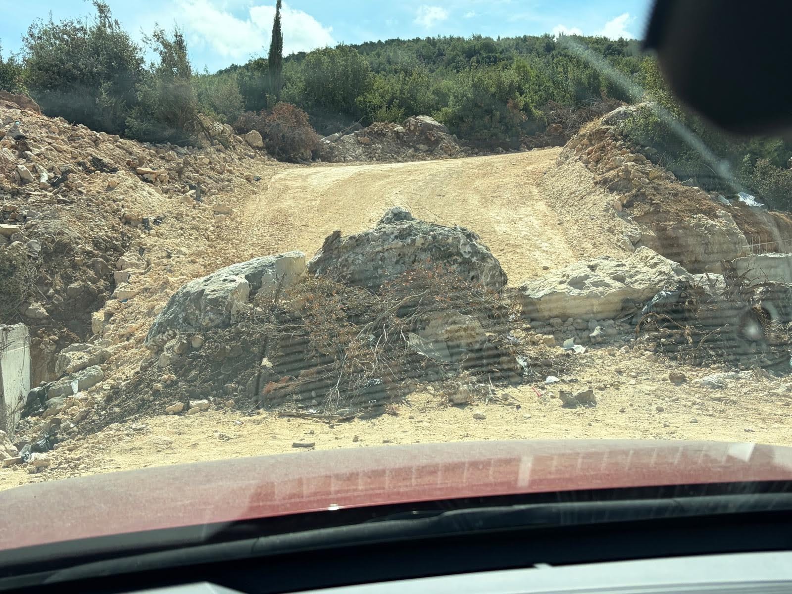 The path leading to his land has also been blocked