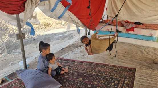 Al-Deir, with a family whose home burned down 10 days ago and has since been rebuilt with the help of neighbors